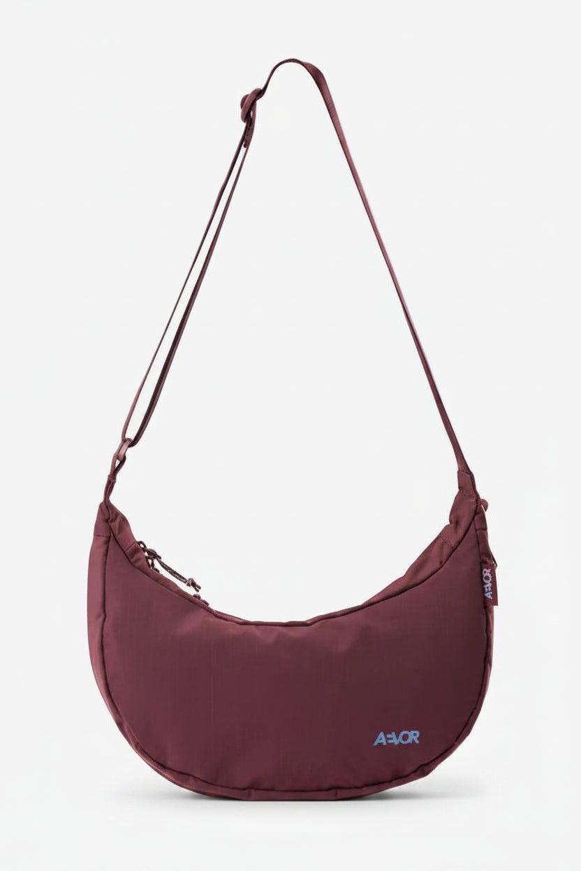 Aevor Bike Sling Bag, Burgundy at BACKYARD